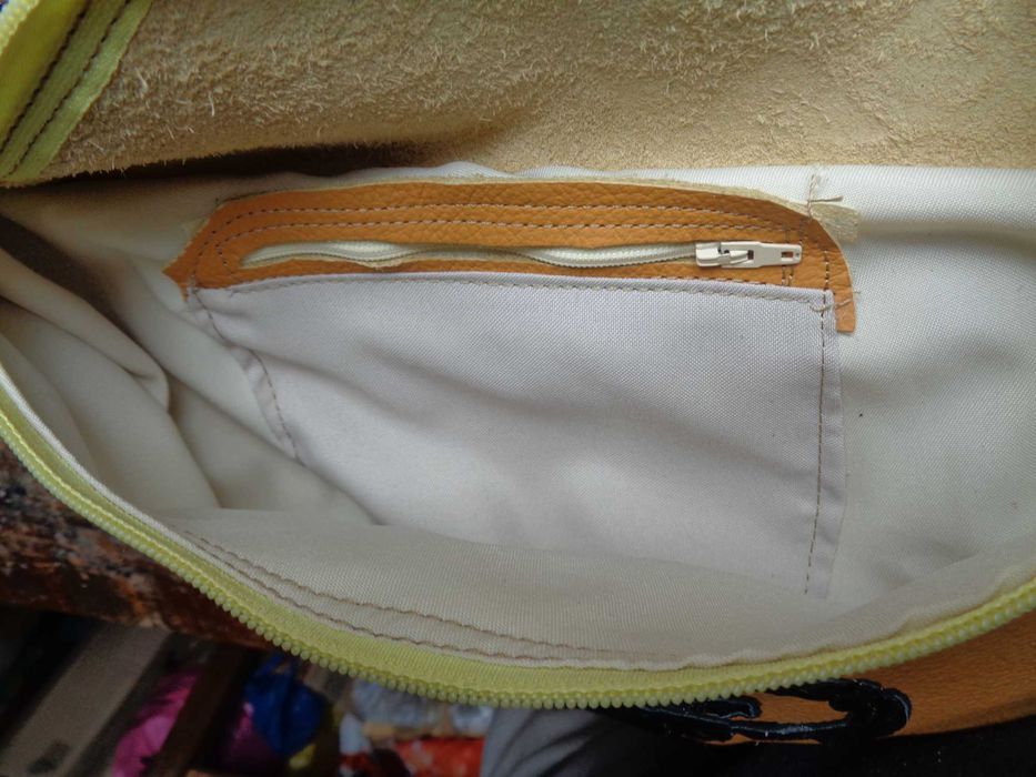 Artystyczna skórzana nerka z kotem. Handmade