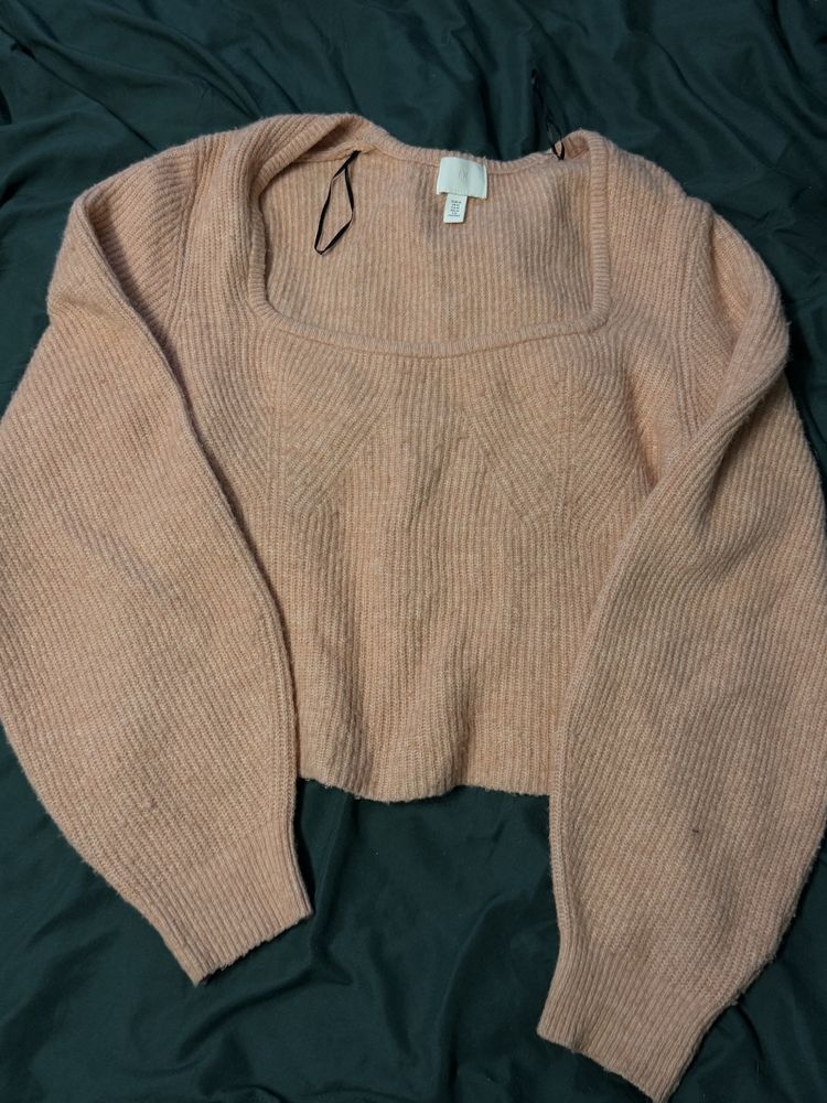 Sweter w kolorze pudrowego różu