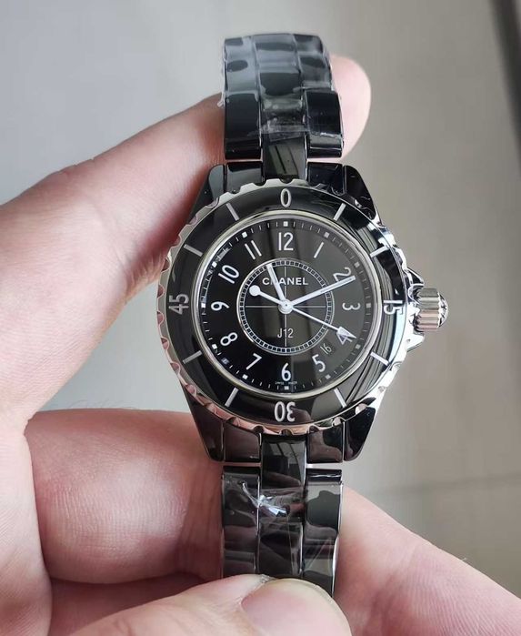 Czarny zegarek męski marki Chanel