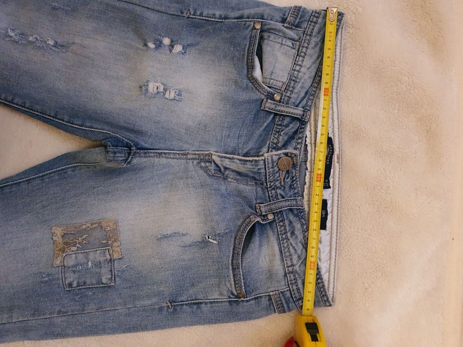 Spodnie dżinsy przetarcia Reserved W27 L32