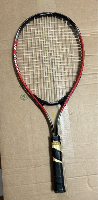 Raquete de tenis usado