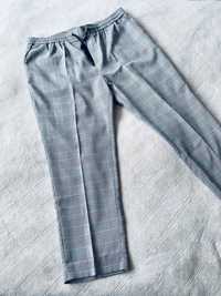 Eleganckie spodnie dresowe w kant / New Look