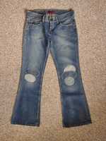 Levi's jeansy dzwony flare łaty 31/32
