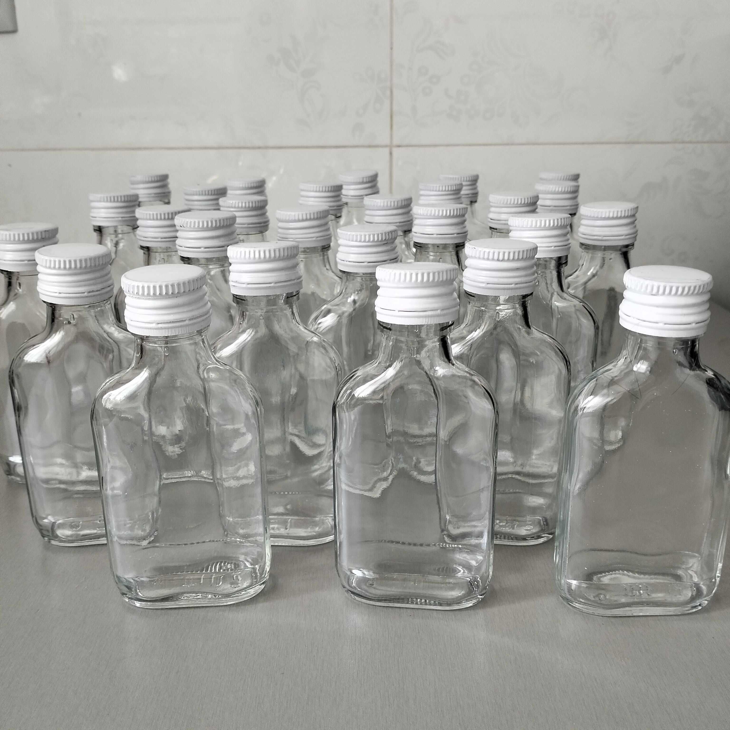 Butelki 100 ml setki 15 sztuk plus zakrętki białe.