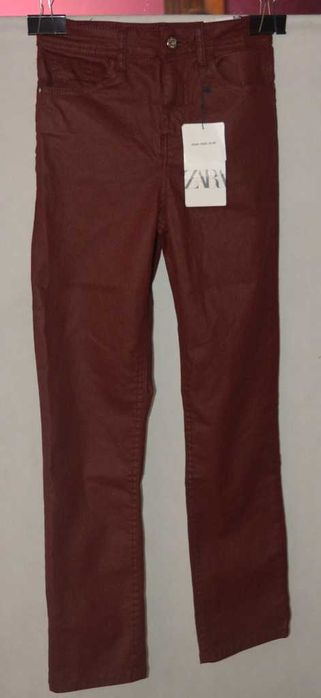 Woskowane jeansy Zara 34