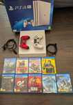 PlayStation 4 Pro Biała z 2 padami + 9 gier
