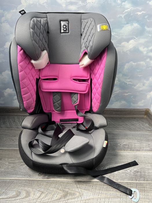 Дитяче рожеве автокрісло Safcom з додатковим боковим захистом