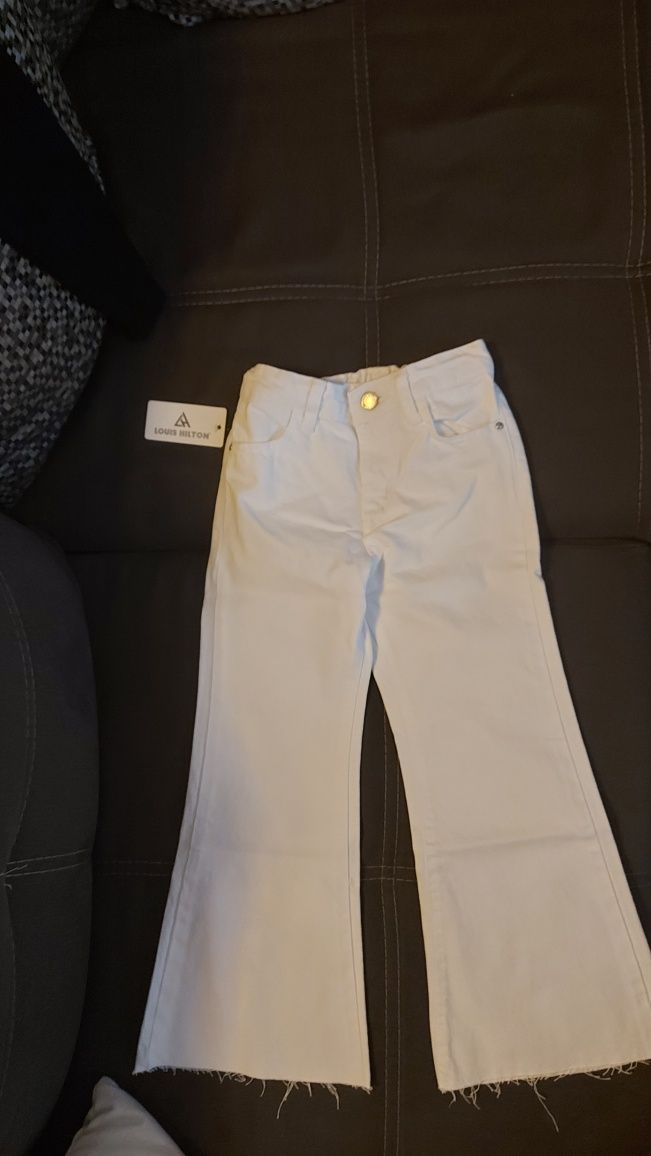 NOWE Spodnie jeansowe dla dziewczynki dzwony 122