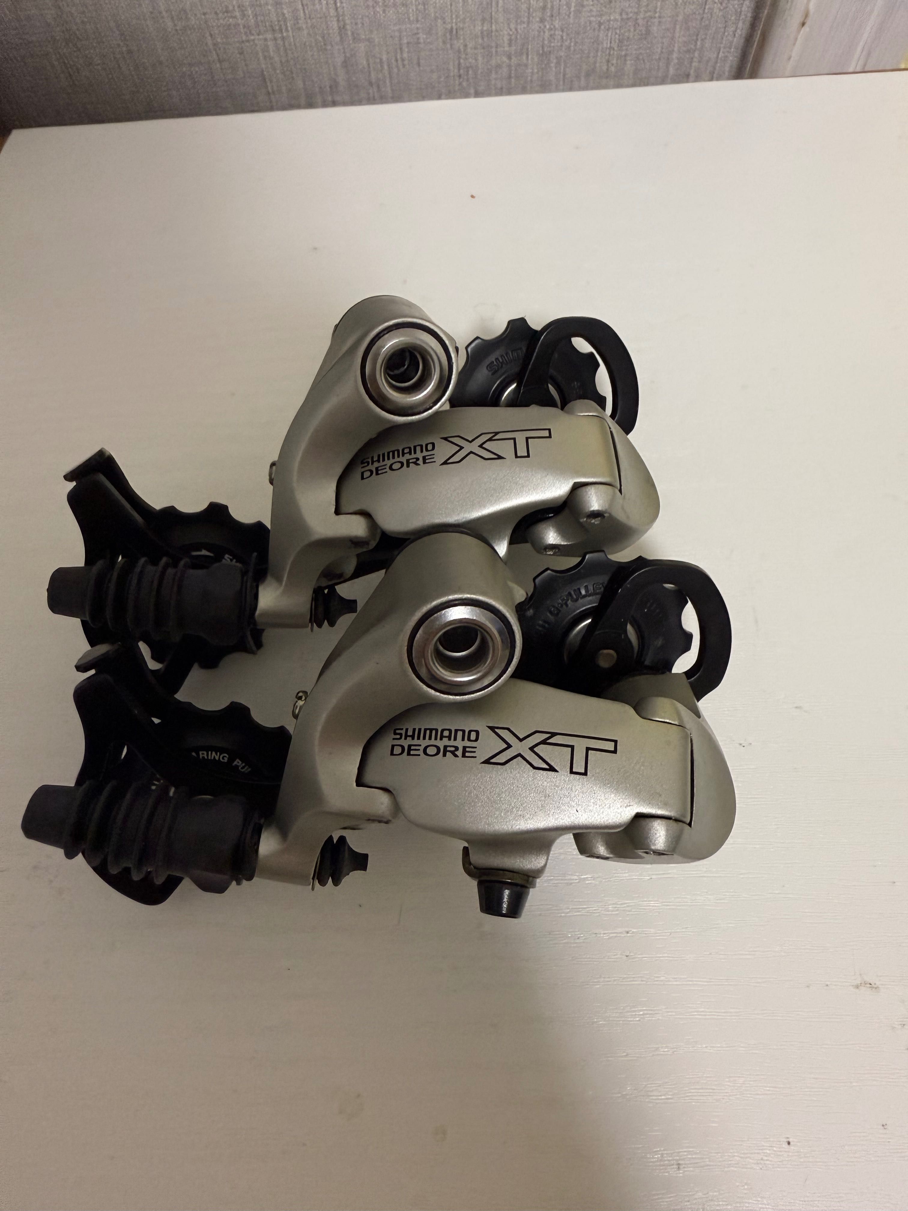 Задній перемикач Shimano Deore XT M750 9 швидкостей