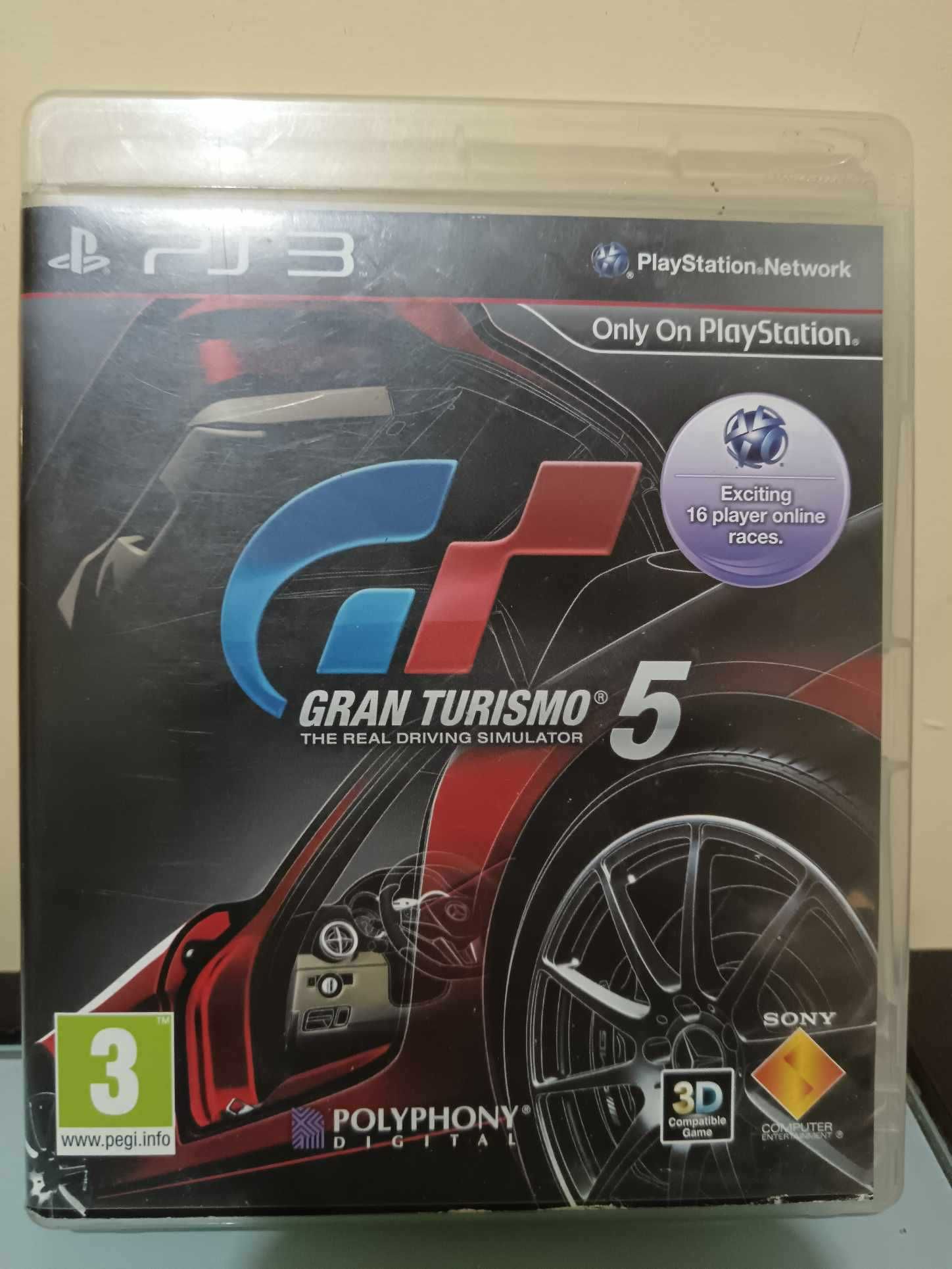PS3 80 GB + comando + 4 jogos
