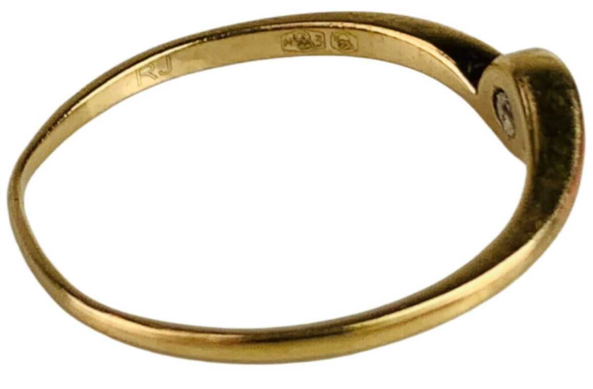 Złoty pierścionek z brylantem próba 585 1,29G r.15 0,01CT