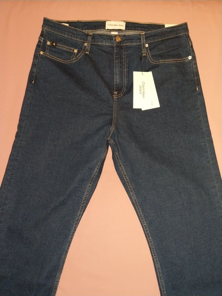 Wyprzedaż spodnie męskie Calvin Klein Jeans.
