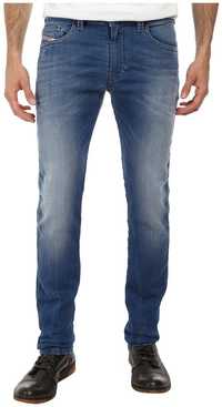 Джинсы DIESEL JoggJeans синего цвета (THAVAR-NE 0837T)