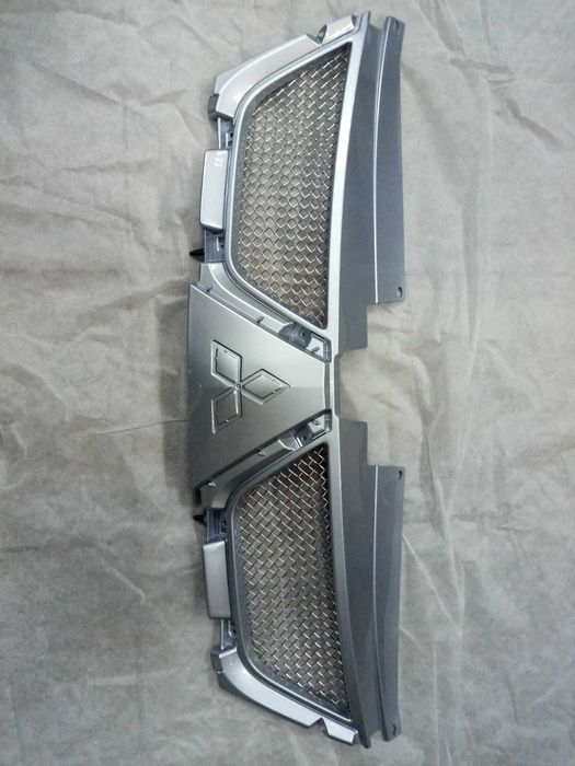 Решетка радиатора Спорт Mitsubishi Outlander XL M313901A31