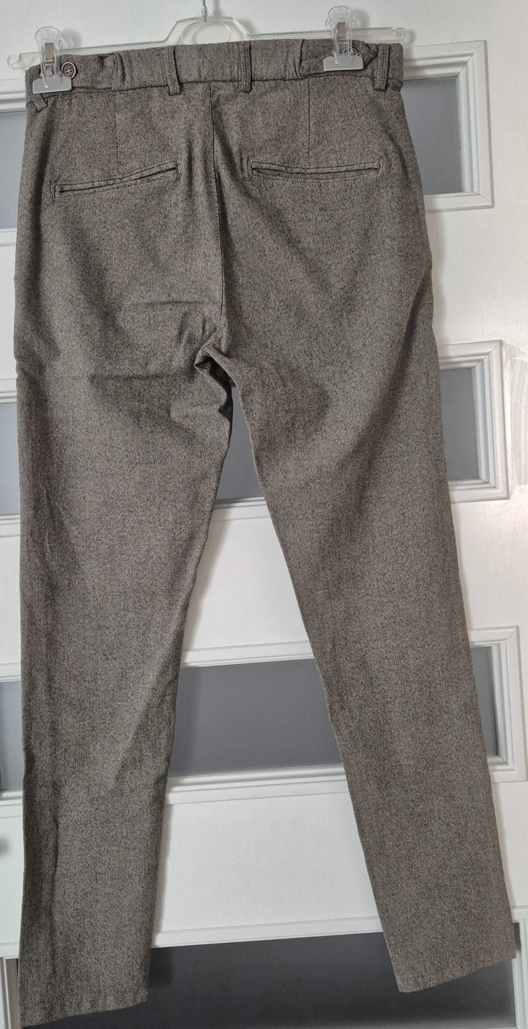 Zara Man męskie spodnie roz 36