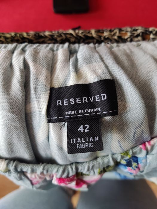 Wzorzysta Kwiatowa bluzka z falbaną Reserved rozmiar 42