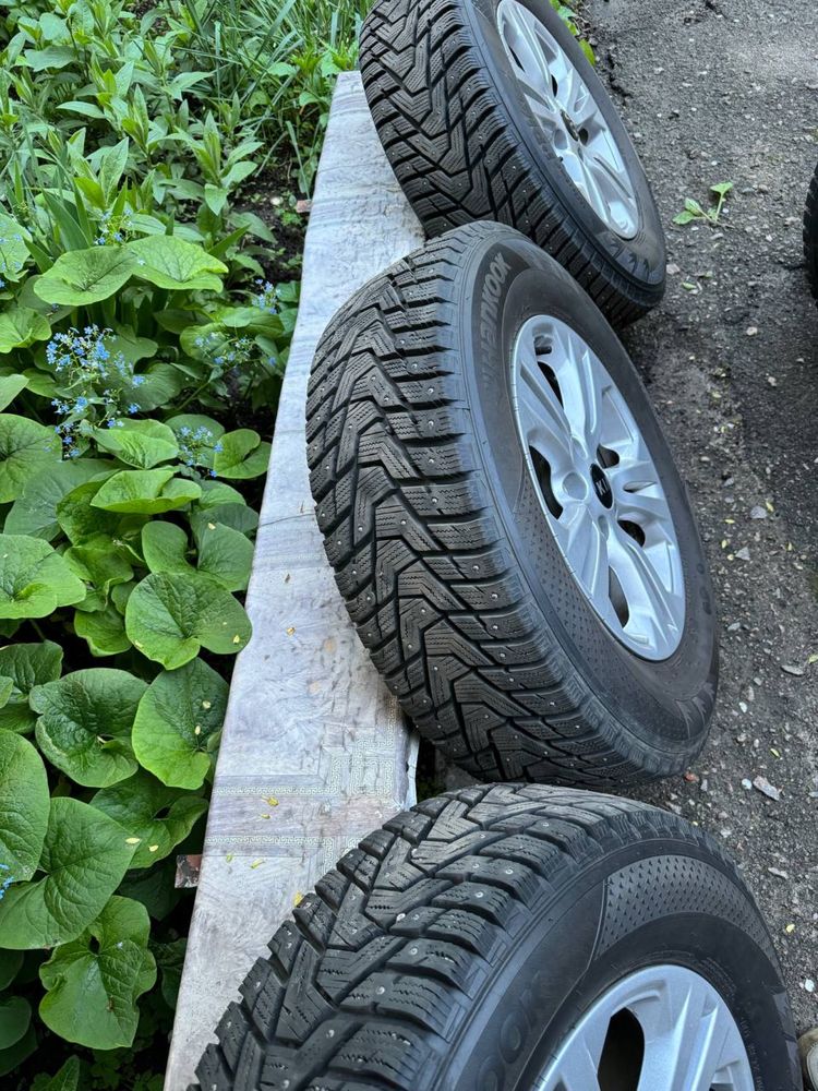 Диски  Kia Sportage з зимовою гумою 215/70 R16