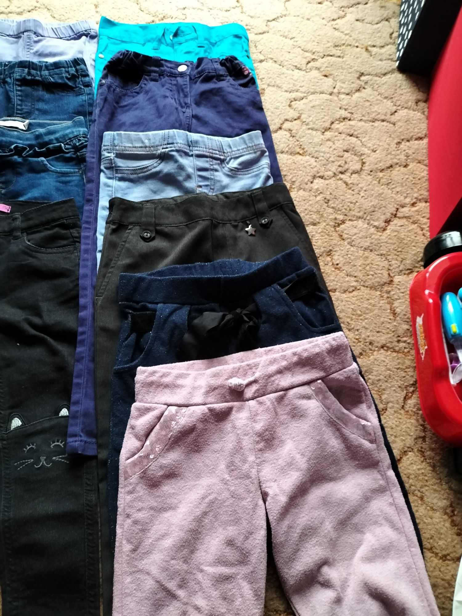 Spodnie dla dziewczynki 15 sztuk rozmiar 98/104/110/116