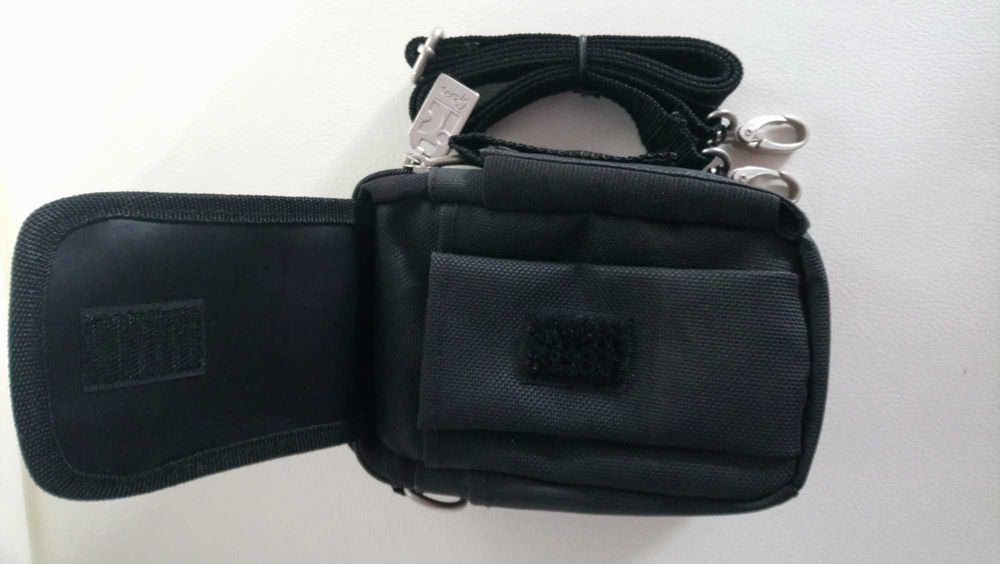 saszetkę męską  na dokumenty i telefon nowa Tanio