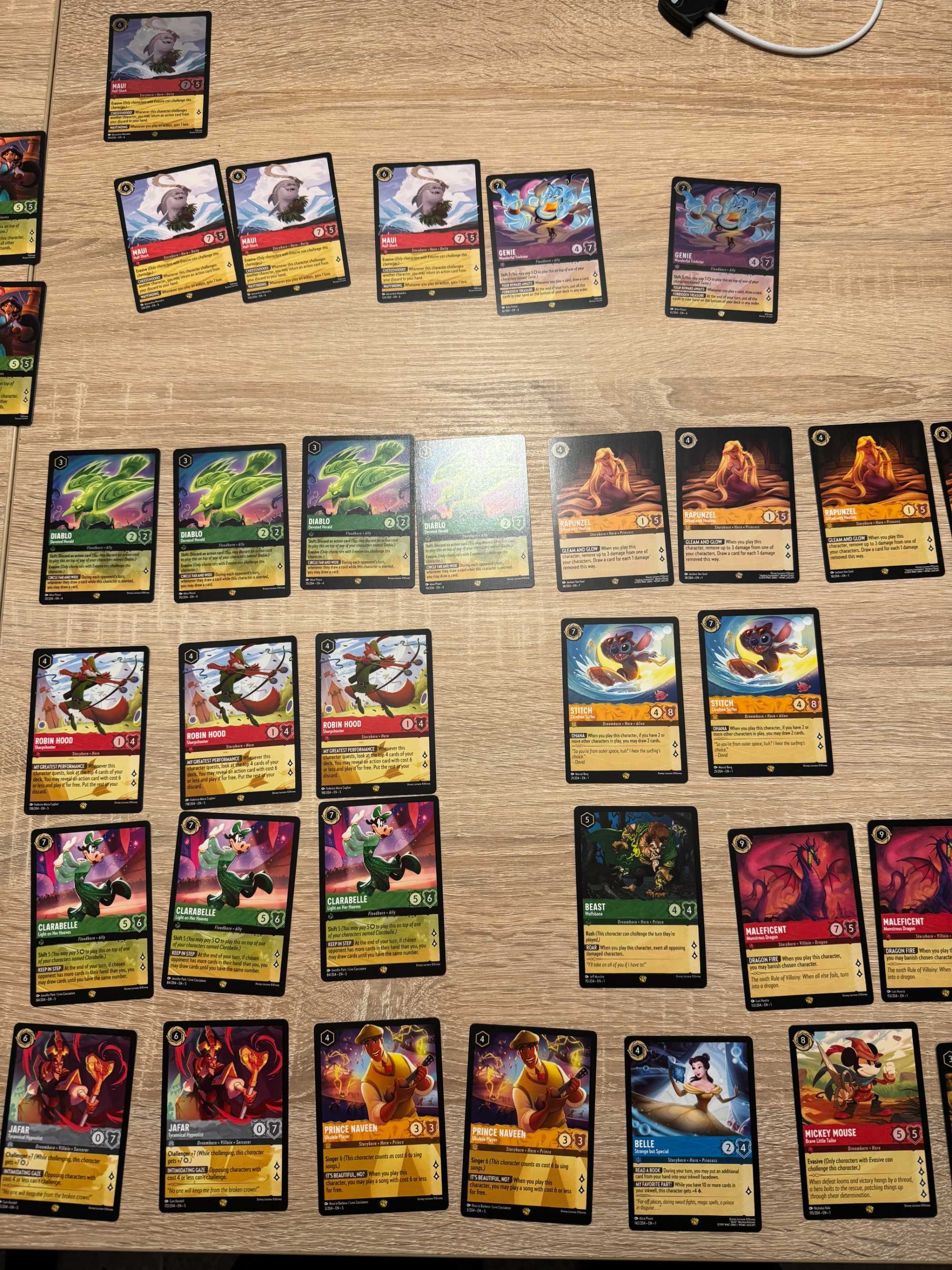 Rozbudowana kolekcja kart Disney Lorcana, top meta karty dodatki 1-7