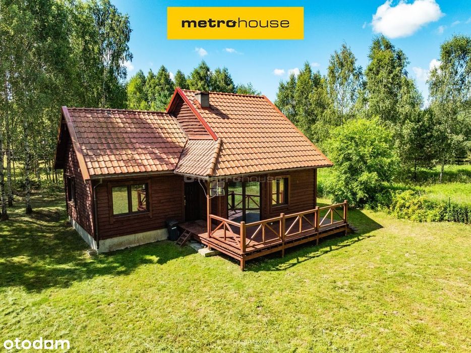 Przytulny dom w pięknej okolicy nad jeziorem.