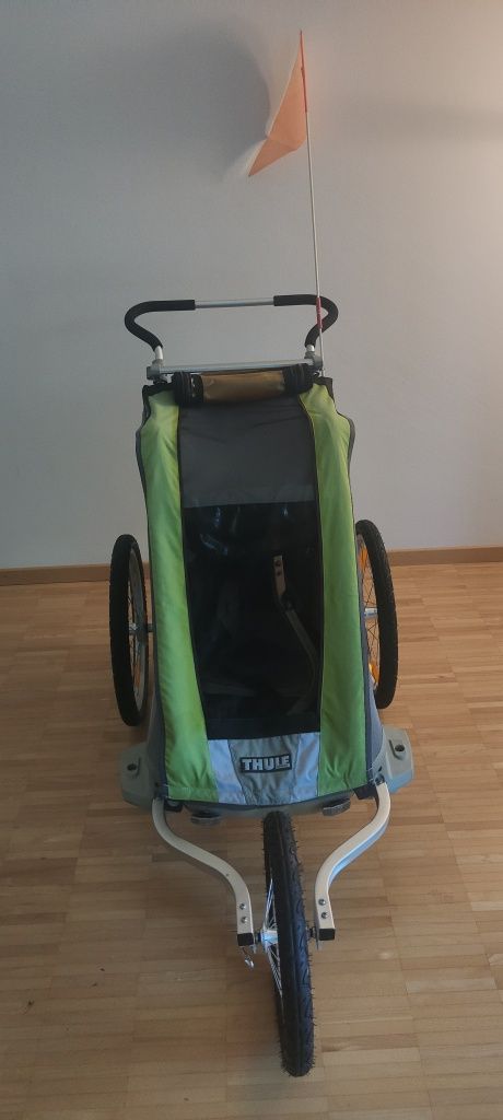 Sprzedam przyczepę do rowera plus Joggingu Thule