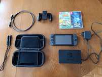Nintendo Switch+2 gry+etui+karta pamięci 64gb