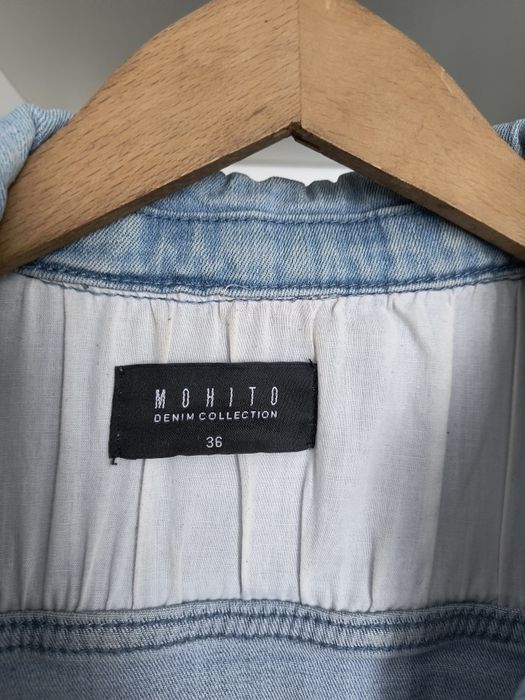 Jeansowa kurtka z przetarciami