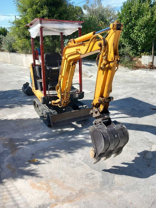 Mini giratoria H15B em bom estado