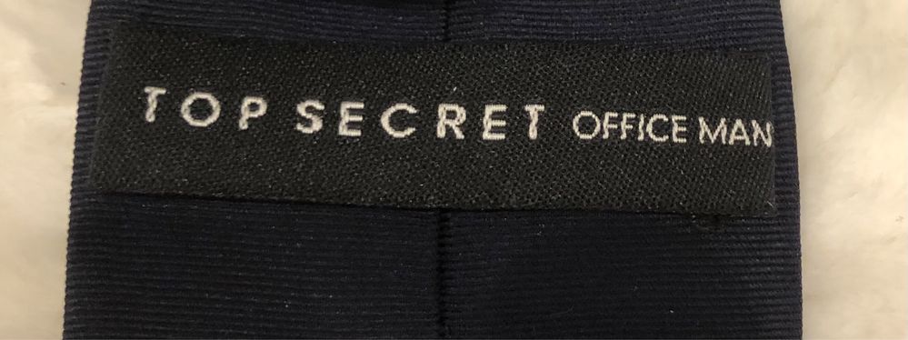 Krawat  ciemno-granatowy,  jedwabny, wąski  Firmy Top Secret