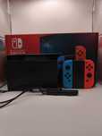 Nintendo Switch + gra Pokémon Sword + kuferek Super Mario