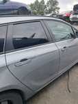 Opel Astra J IV drzwi prawy tył kombi Z179