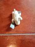 peluche pequeno cao beje