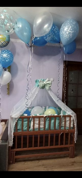 Дитяче ліжечко з балдахіном,матрасом боковинками і постільним