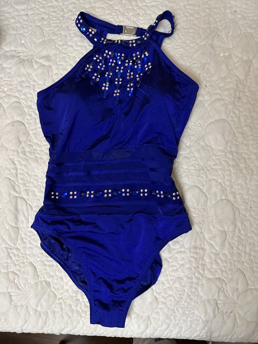 Купальники суцільні