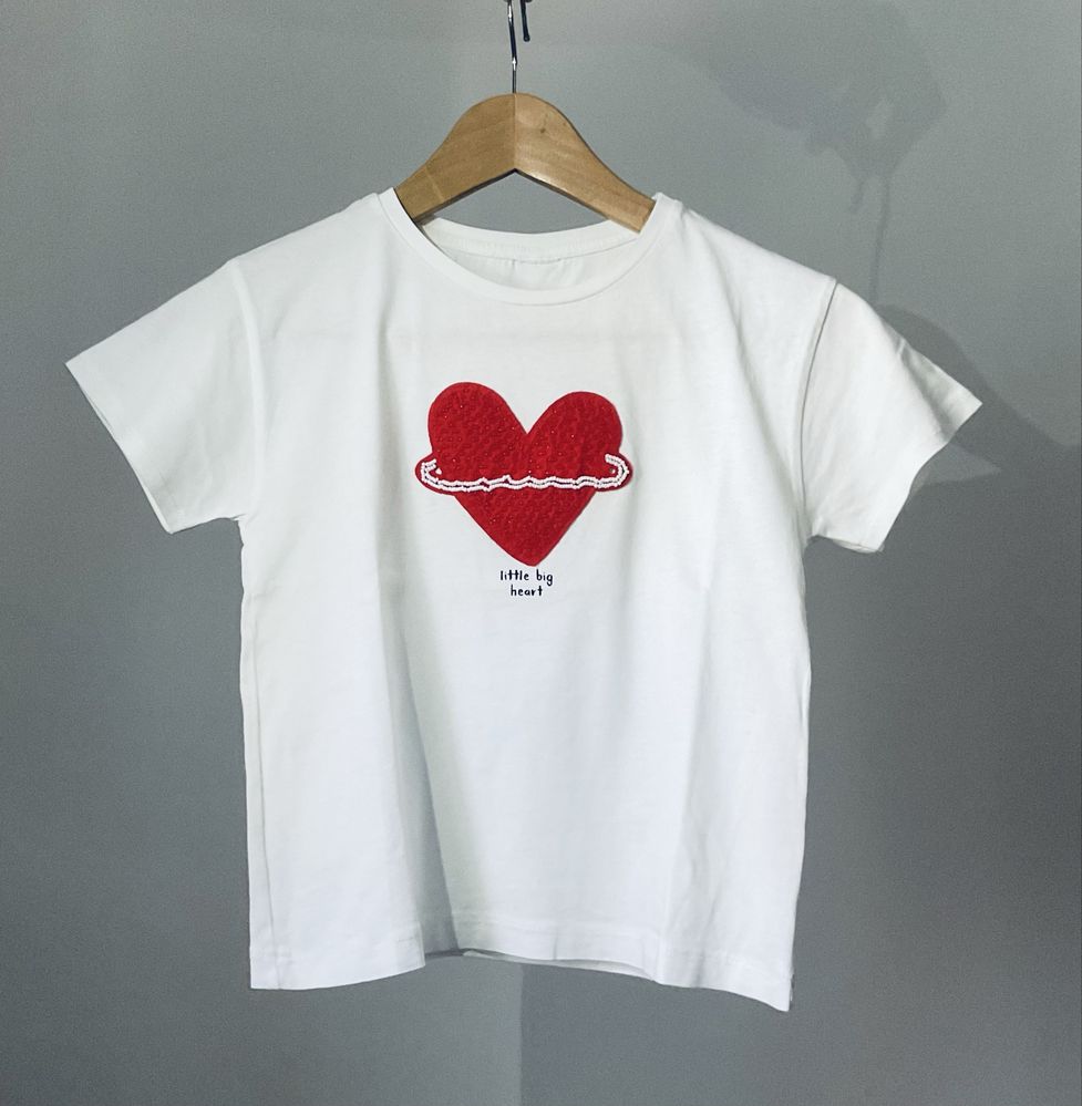 Roupa criança com um coração