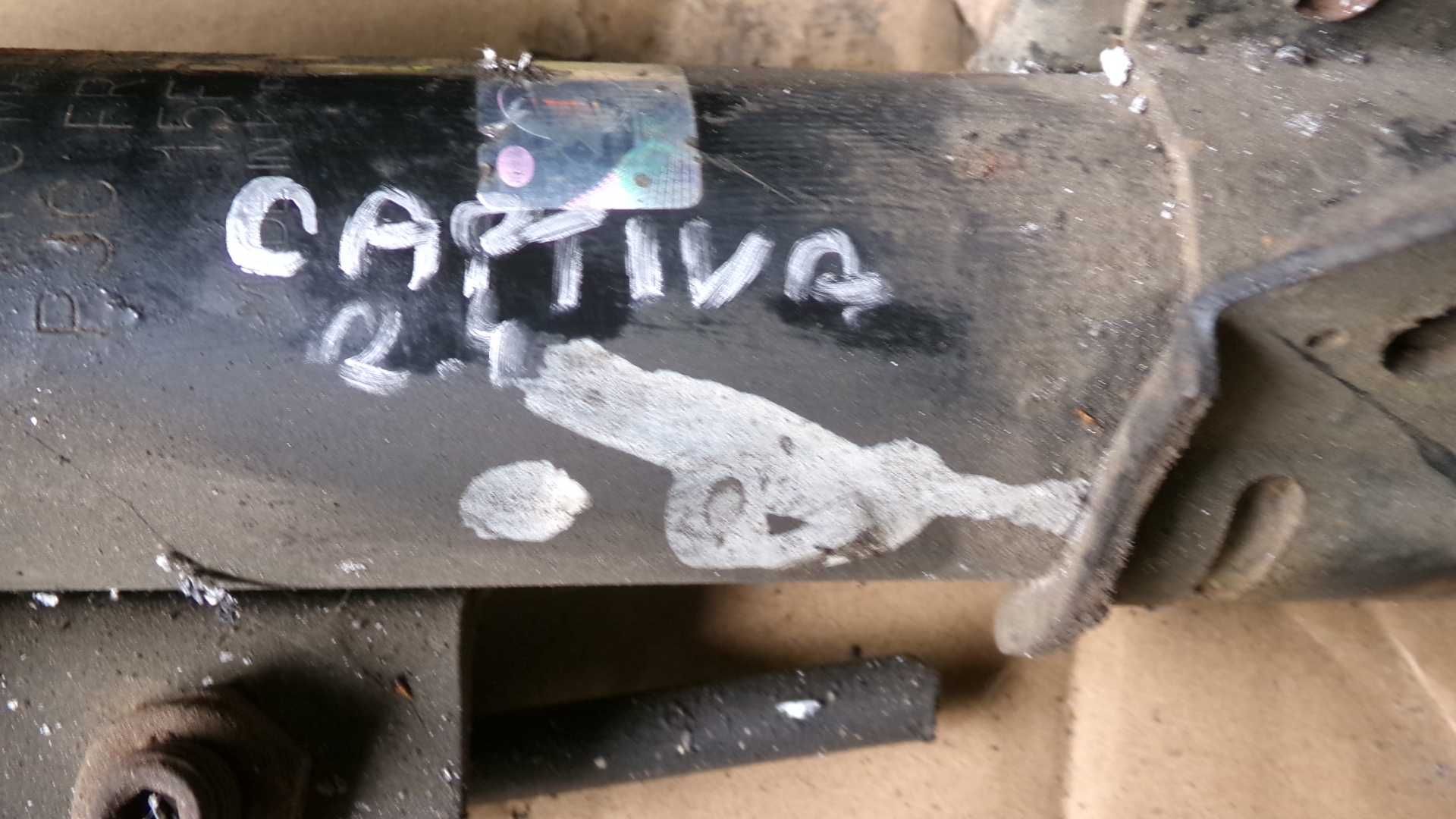Kwi5 Amortyzator + sprężyna mcperson przedni prawy captiva 2.4