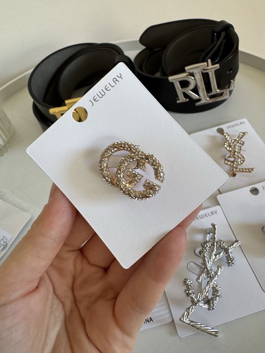 Брошки брендові