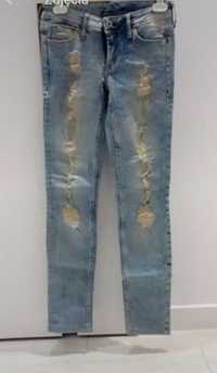 Spodnie jeansy jeansowe dżinsy damskie rurki skinny przetarcia H&M XS