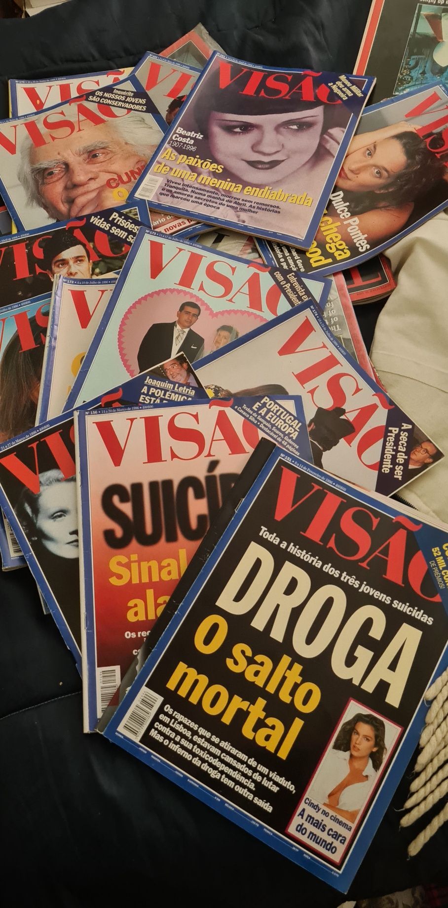 Revistas "time"," Visão","Courier-Journal"