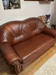 Skórzana sofa z funkcją spania + fotel