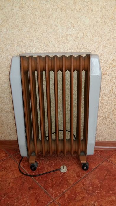 Камін масляний, обігрівач масляний.