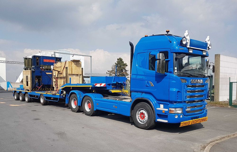 Доставка будівельної техніки - Тралом /Площадкою /Платформою