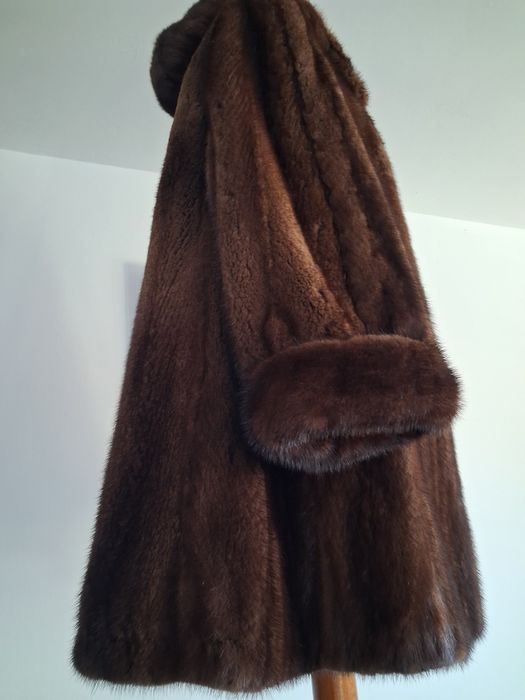 Norki.. futerko koloru brązowego z kapturem