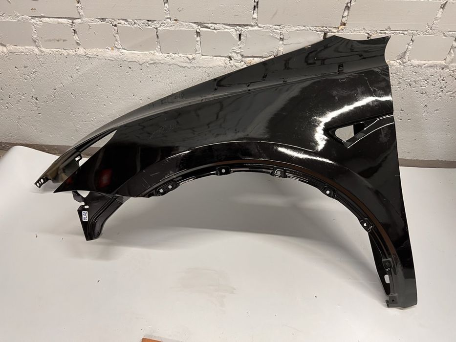 Оригінальне переднє Ліве Крило на Tesla Y чорне