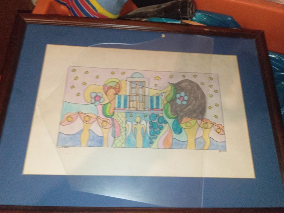 Pintura desenho assinado metade do vidro lá  ao consigo tirar