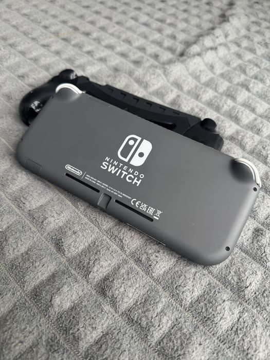 Ігрова приставка Nintendo switch lite 64+32gb K€FIR