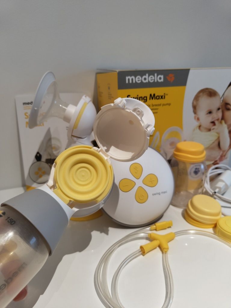 Laktator Medela Swing Maxi + gorset + gratisy