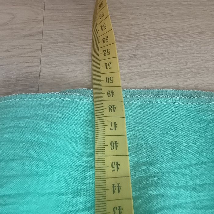 Krótka spódnica z falbanami mietowa M/L r