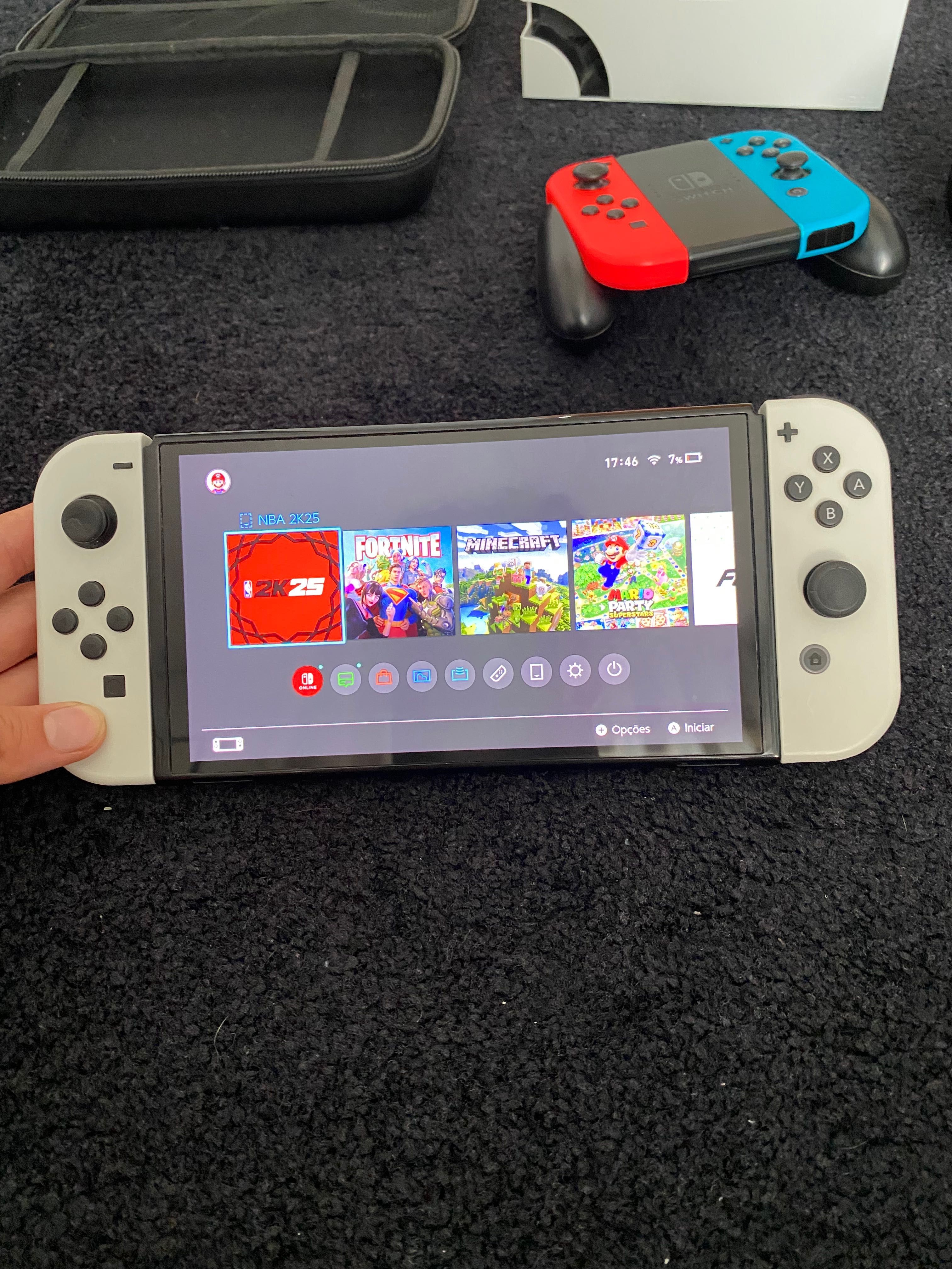 Nintendo switch oled+11 jogos físicos+ 2 joycon extra+cartão128gb+5dig